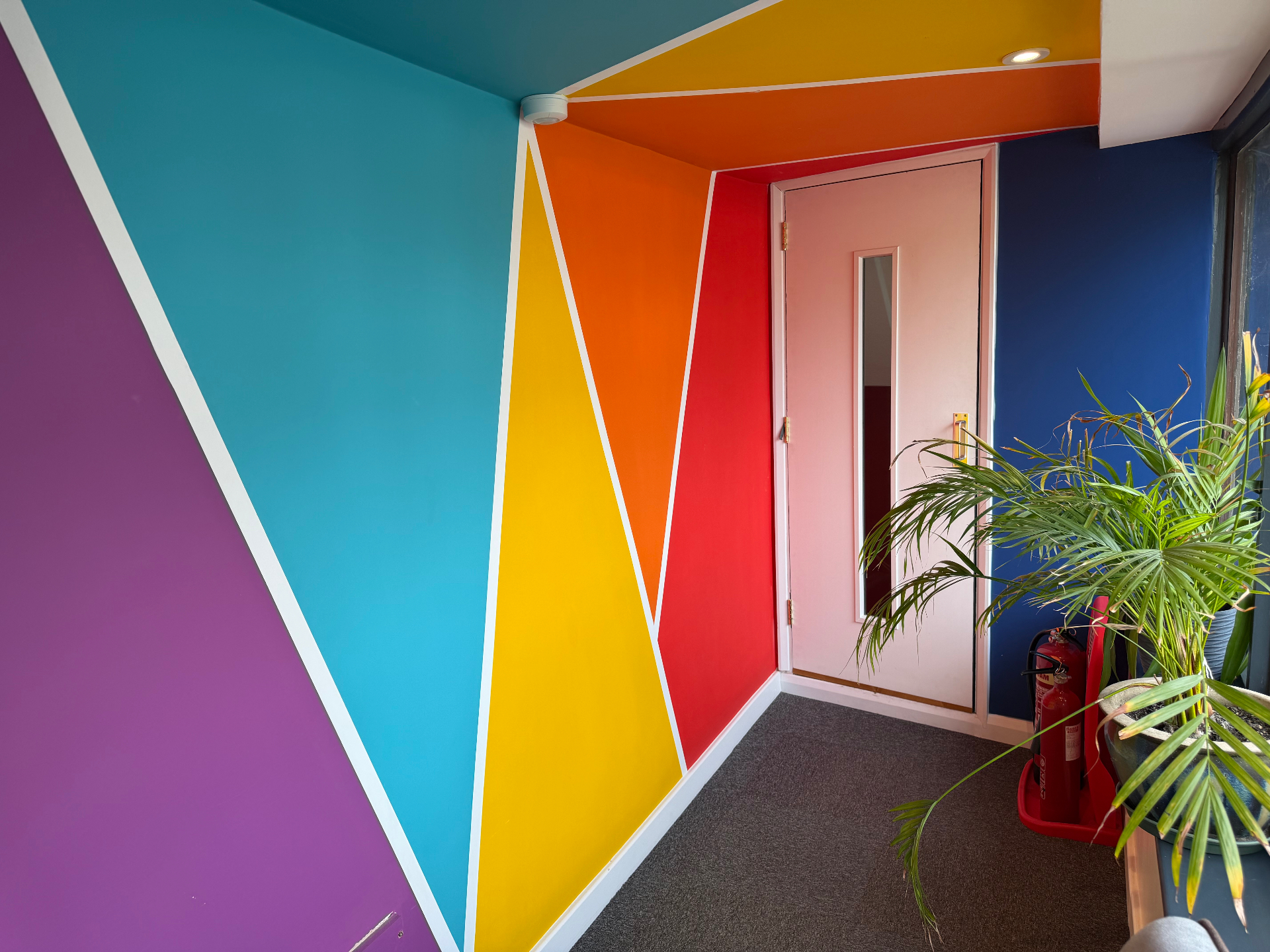 The colourful hallway at Abacas House, NM Business Suites